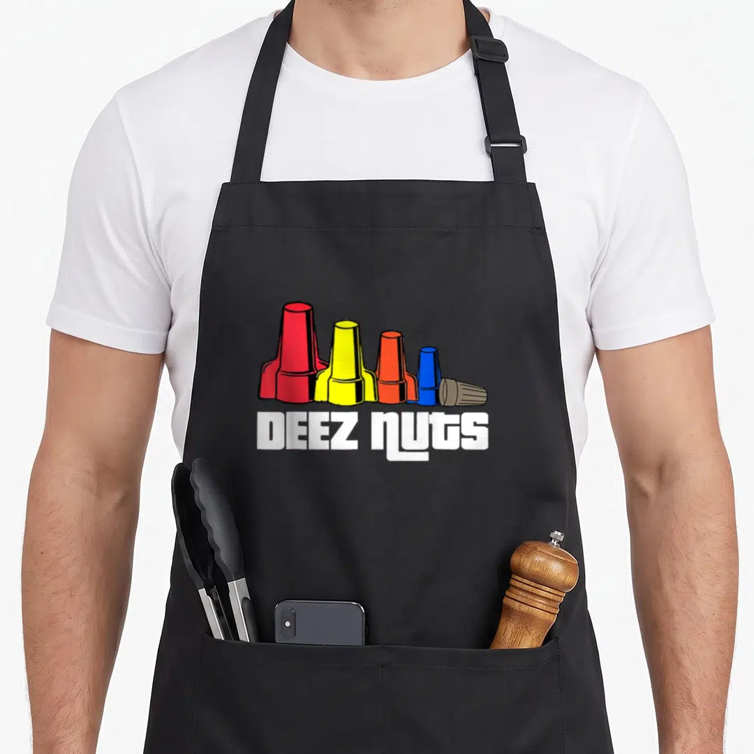 Deez electrician apron - Five colorful wire nuts in red yellow orange blue and brown with white text — shown on a black cotton canvas apron against a white background