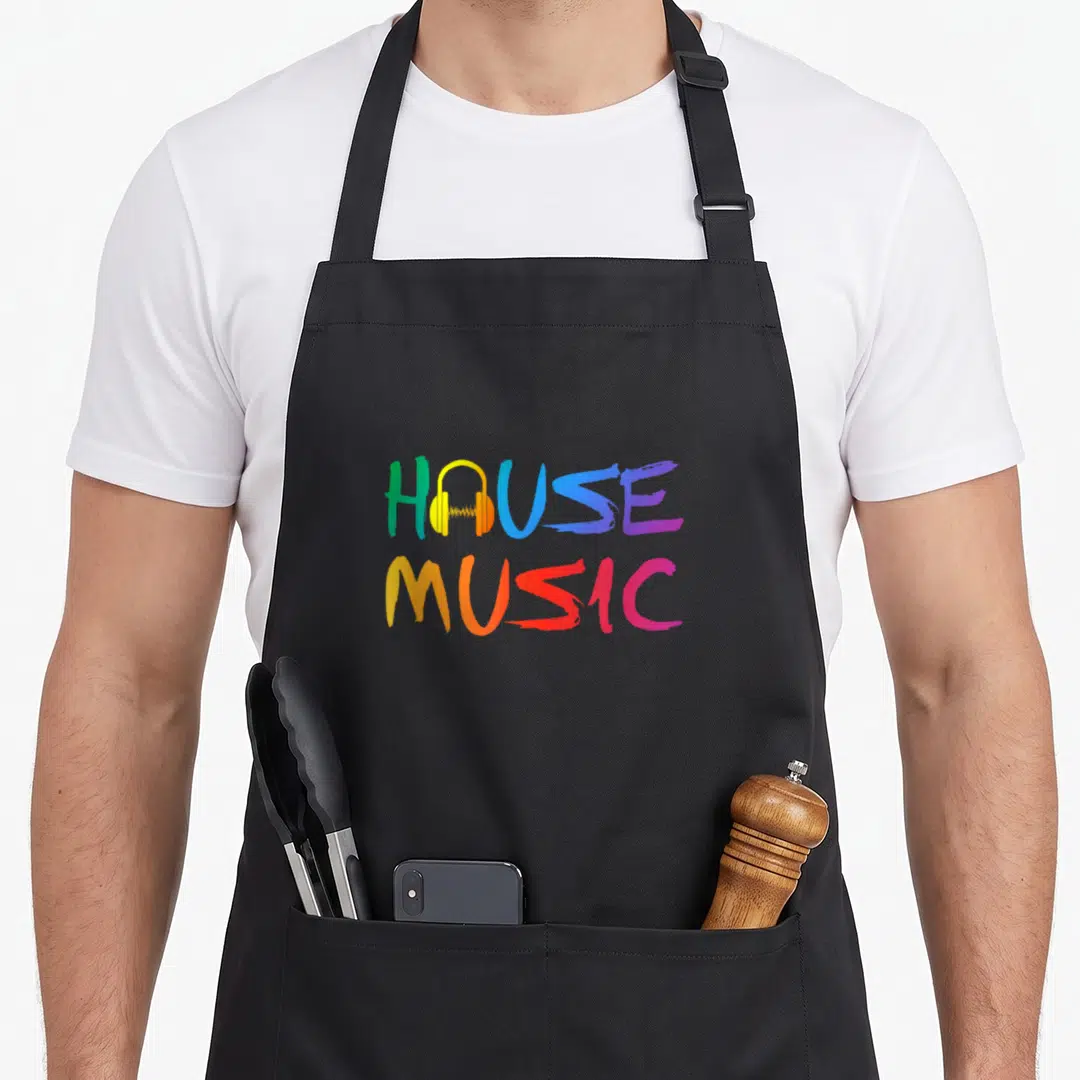 Music enchantments apron - Colorful HOUSE MUSIC text with yellow headphones replacing the O in two stacked lines — shown on a black cotton canvas apron against a white background