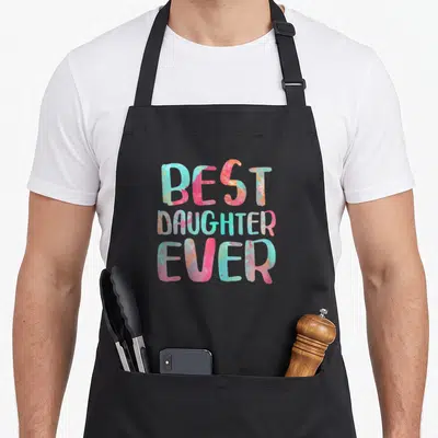 Daughter mother's day aprons - Stacked Best Daughter Ever text in pink blue and orange watercolor style — shown on a black cotton canvas apron against a white background