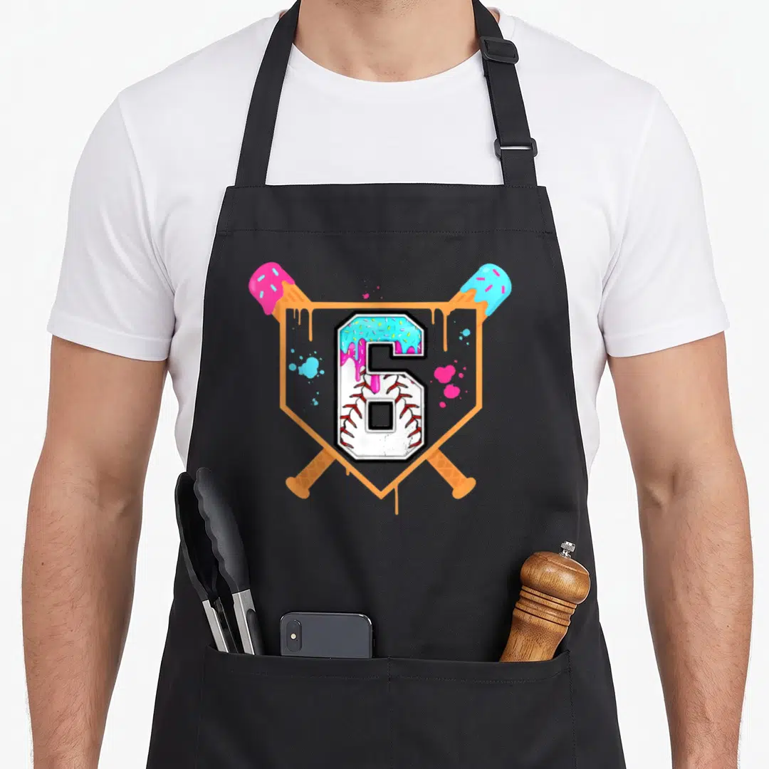 6th ice cream apron - Number 6 inside orange shield with crossed pink and blue ice cream cones and splatters — shown on a black cotton canvas apron against a white background