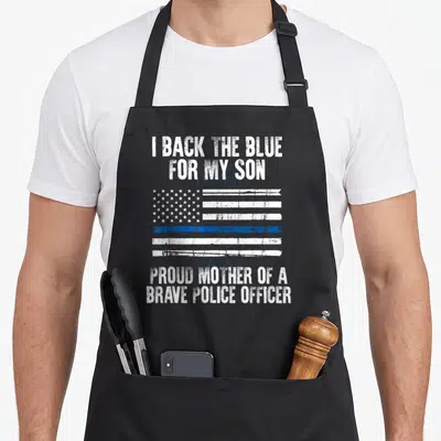 Police mom and son aprons - Distressed thin blue line flag with white text supporting a police officer son — shown on a black cotton canvas apron against a white background
