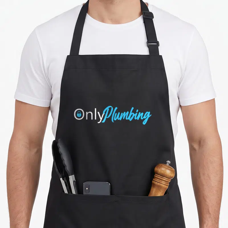 Funny plumbing plumber apron - OnlyPlumbing text with blue lock icon inside the O in white and light blue script — shown on a black cotton canvas apron against a white background