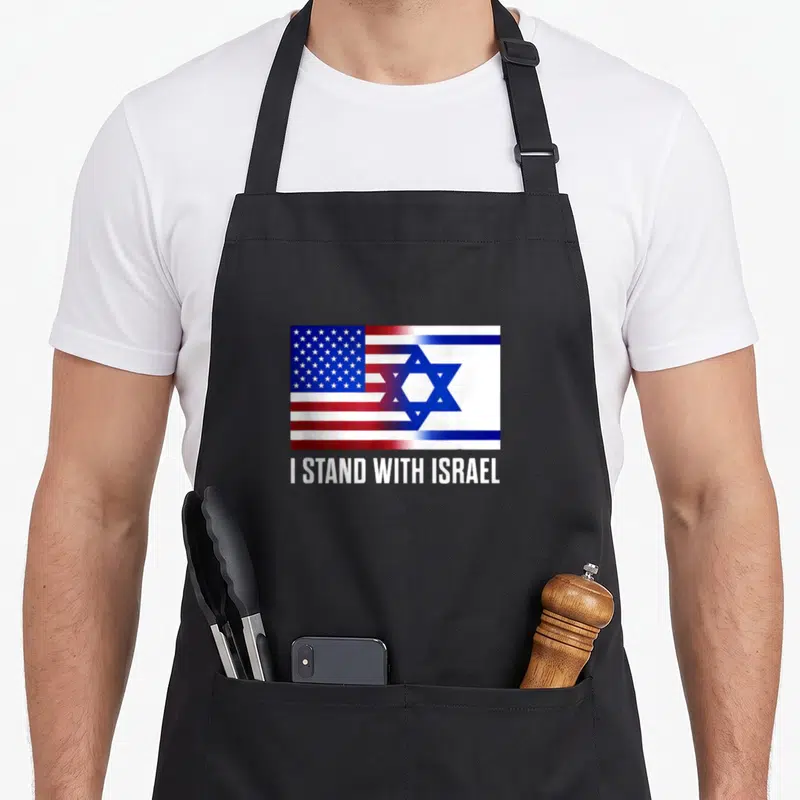 Stand patriotic apron - Combined USA and Israel flag with I STAND WITH ISRAEL text in blue red white — shown on a black cotton canvas apron against a white background