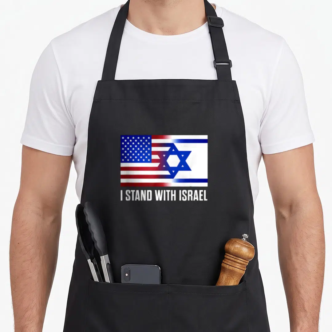 Stand patriotic apron - Combined USA and Israel flag with I STAND WITH ISRAEL text in blue red white — shown on a black cotton canvas apron against a white background