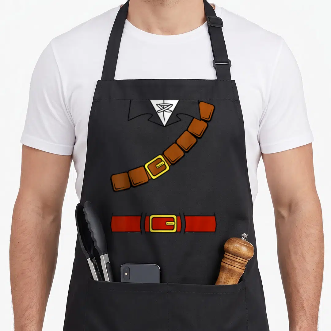 Link basic apron - Cartoon brown and red segmented belts with yellow buckles over grey collar and white tie — shown on a black cotton canvas apron against a white background