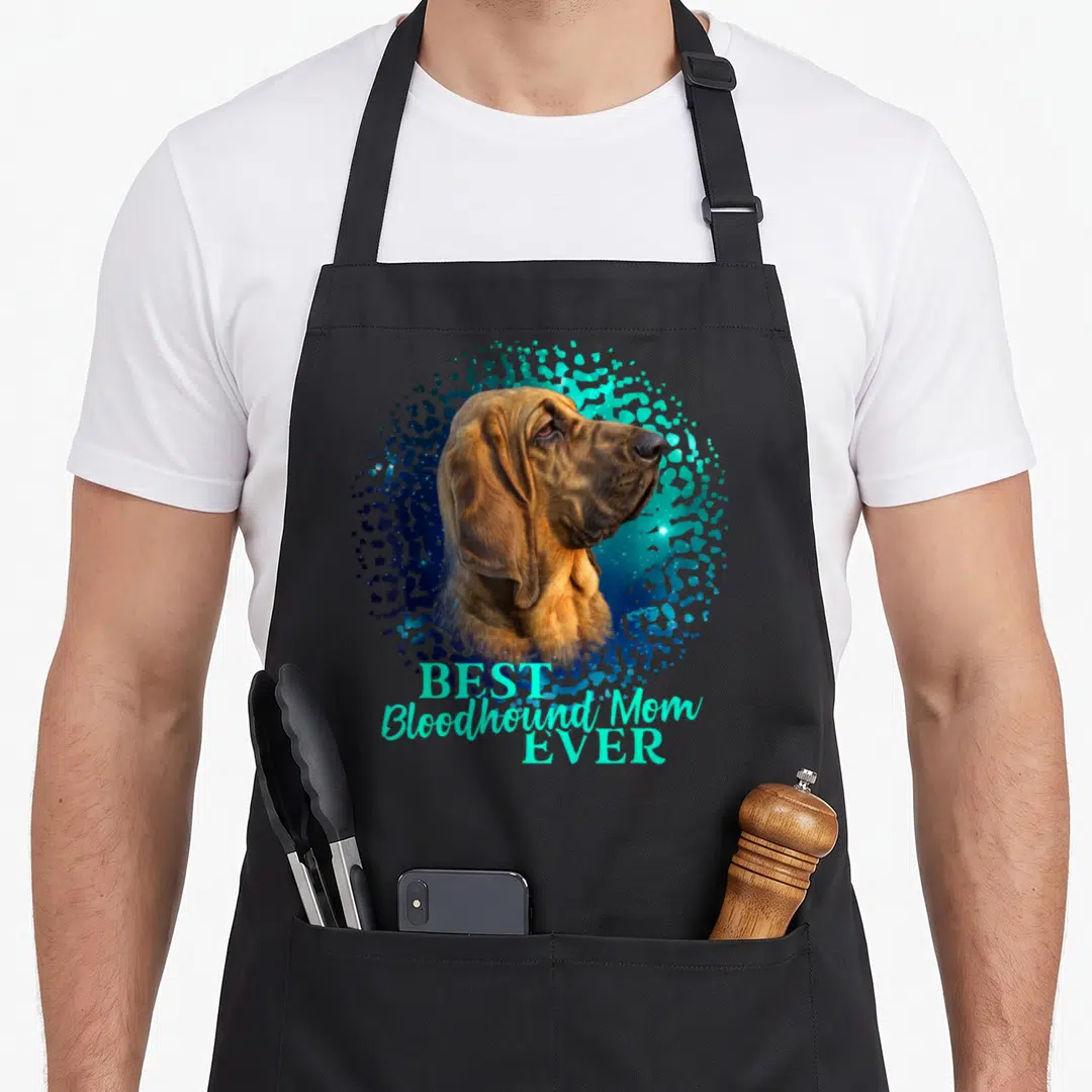 Bloodhound owner dog apron - Realistic brown bloodhound head inside blue teal splash with BEST Bloodhound Mom EVER text — shown on a black cotton canvas apron against a white background