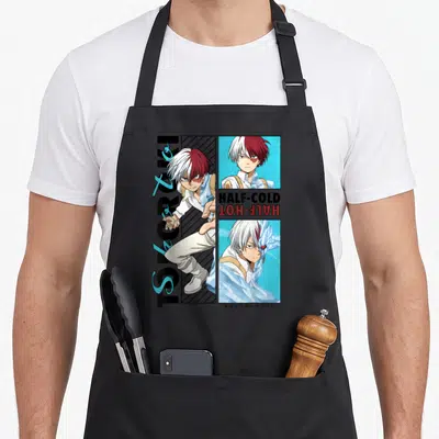 Todoroki anime apron - Shoto Todoroki full body and portraits with HALF-COLD HALF-HOT text — shown on a black cotton canvas apron against a white background