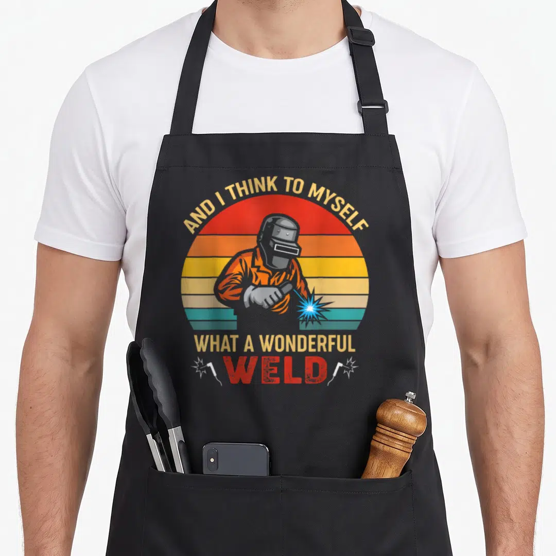 Myself crazy hummingbird man apron - Retro welder silhouette against striped sun with pun text about welding — shown on a black cotton canvas apron against a white background