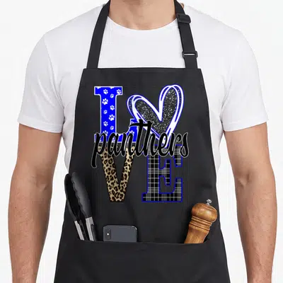 School pride apron - LOVE panthers text design with heart O, leopard print V, plaid E, and paw print L in blue and black — shown on a black cotton canvas apron against a white background