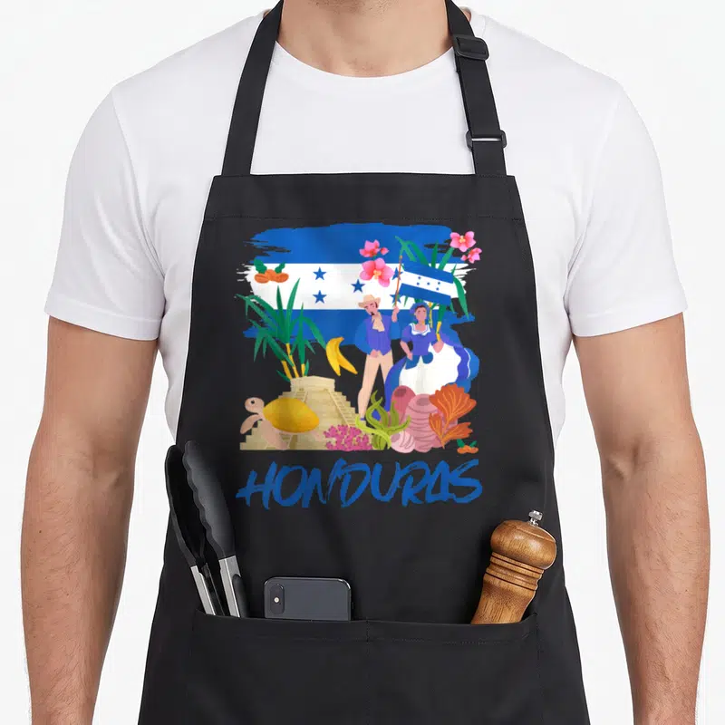 Honduras fancy apron - Cartoon of traditional figures, turtle, pyramid, and HONDURAS text on blue and white flag — shown on a black cotton canvas apron against a white background