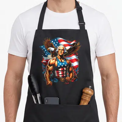 Patriotic george 4th of july apron - Muscular George Washington in flag tank top with eagle and waving USA flag — shown on a black cotton canvas apron against a white background