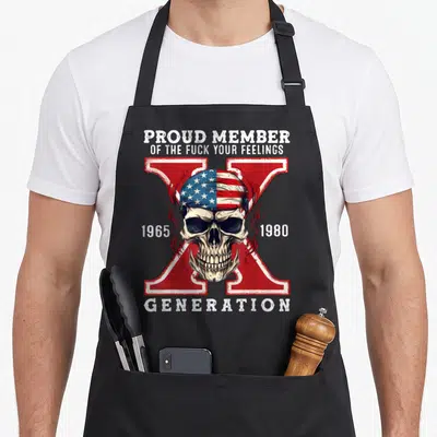 Proud skull apron - Realistic skull in US flag bandana over red X with 1965 1980 text — shown on a black cotton canvas apron against a white background