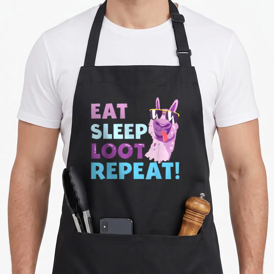 Eat birthday apron - Llama with sunglasses next to stacked EAT SLEEP LOOT REPEAT text in purple blue yellow — shown on a black cotton canvas apron against a white background