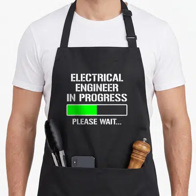 Electrical progress engineer apron - White stencil text reading electrical engineer in progress above a green loading — shown on a black cotton canvas apron against a white background
