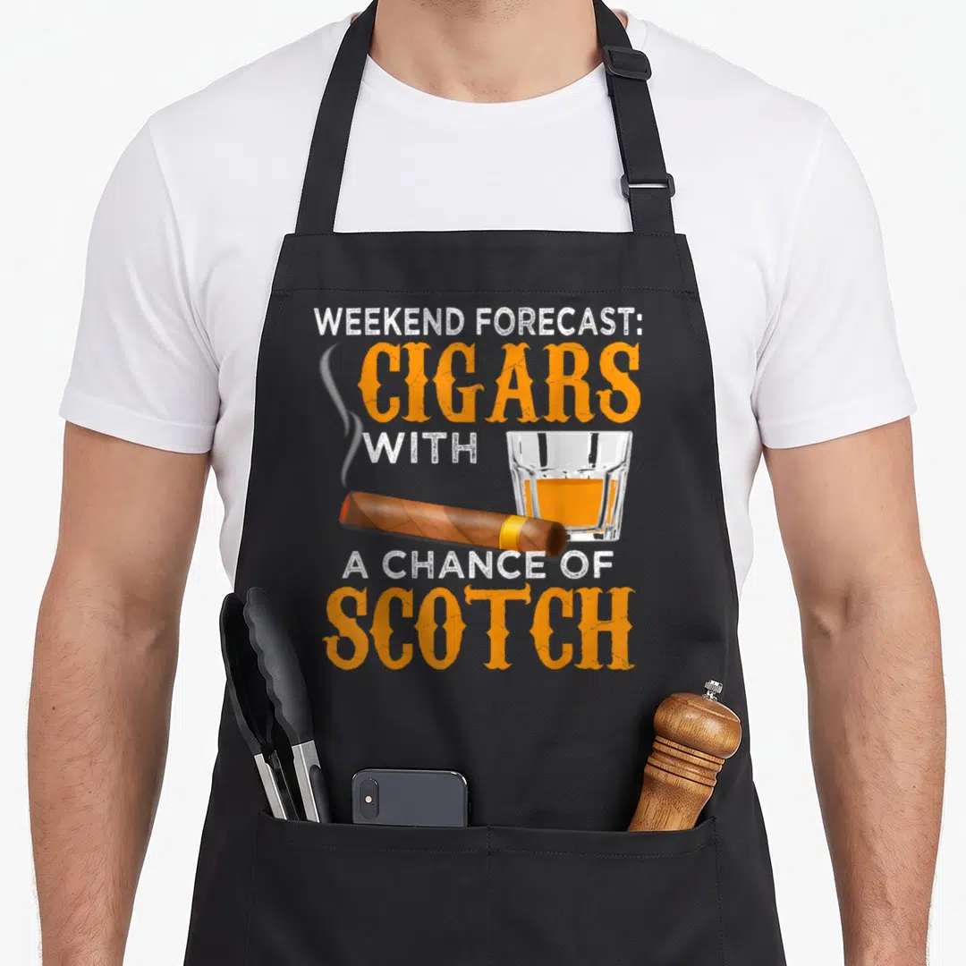 Forecast weekend mode apron - Realistic brown cigar and scotch glass over stacked orange and white text — shown on a black cotton canvas apron against a white background