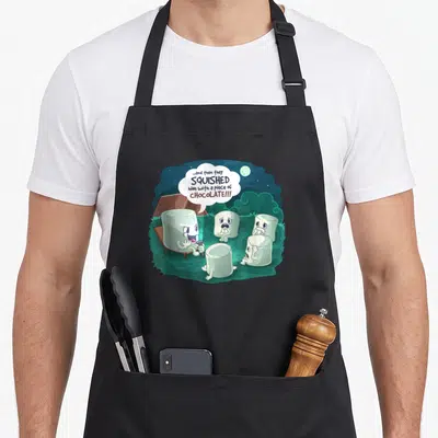 Marshmallow story of the apron - Five marshmallows at a campfire with text about being squished by chocolate — shown on a black cotton canvas apron against a white background