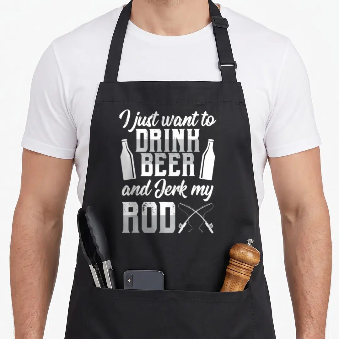 Beer fishing aprons - White stacked text I just want to drink beer and jerk my rod flanked by bottles and crossed rods — shown on a black cotton canvas apron against a white background