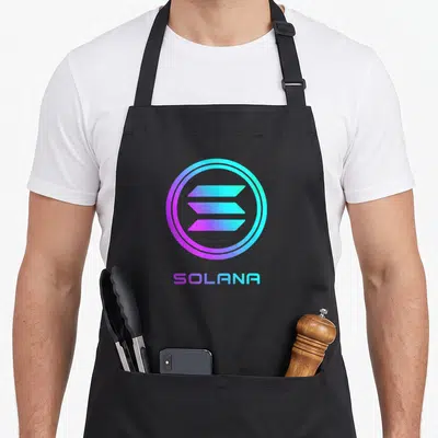 Solana crypto apron - SOLANA logo with three stacked parallelograms in purple, cyan, and blue gradients — shown on a black cotton canvas apron against a white background