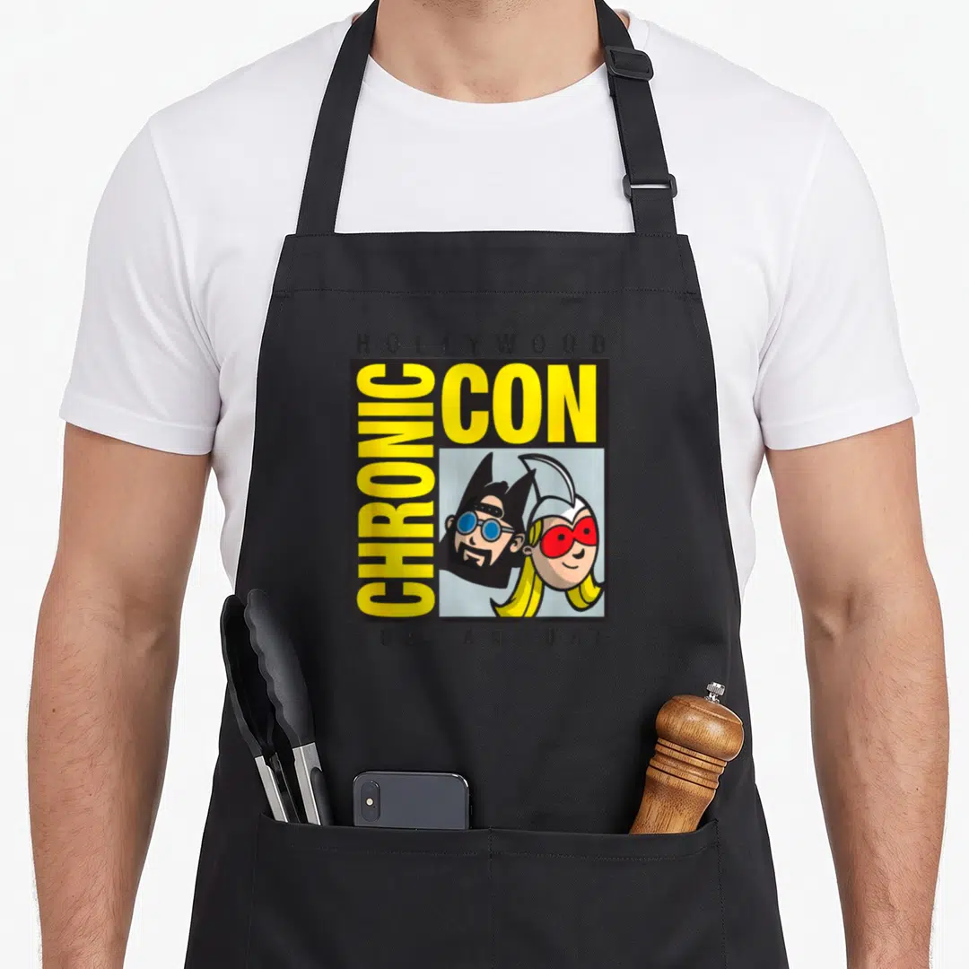 Jay hollywood apron - Hollywood Chronic Con 10th Annual cartoon logo with man and woman characters — shown on a black cotton canvas apron against a white background