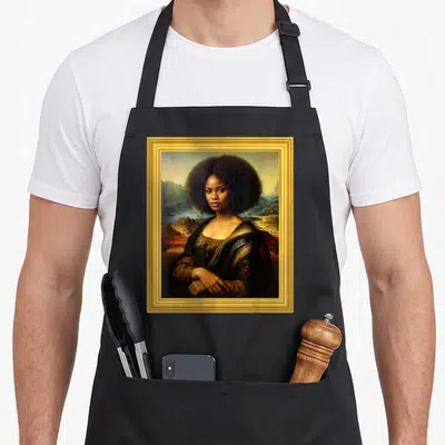 Mona african apron - Realistic portrait of a woman with an afro inside an ornate gold frame with a landscape background — shown on a black cotton canvas apron against a white background