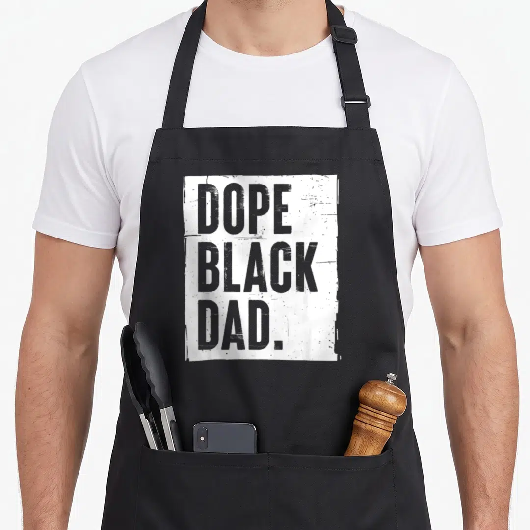 Cute dope father day apron - Grey DOPE BLACK DAD text inside distressed white rectangle — shown on a black cotton canvas apron against a white background