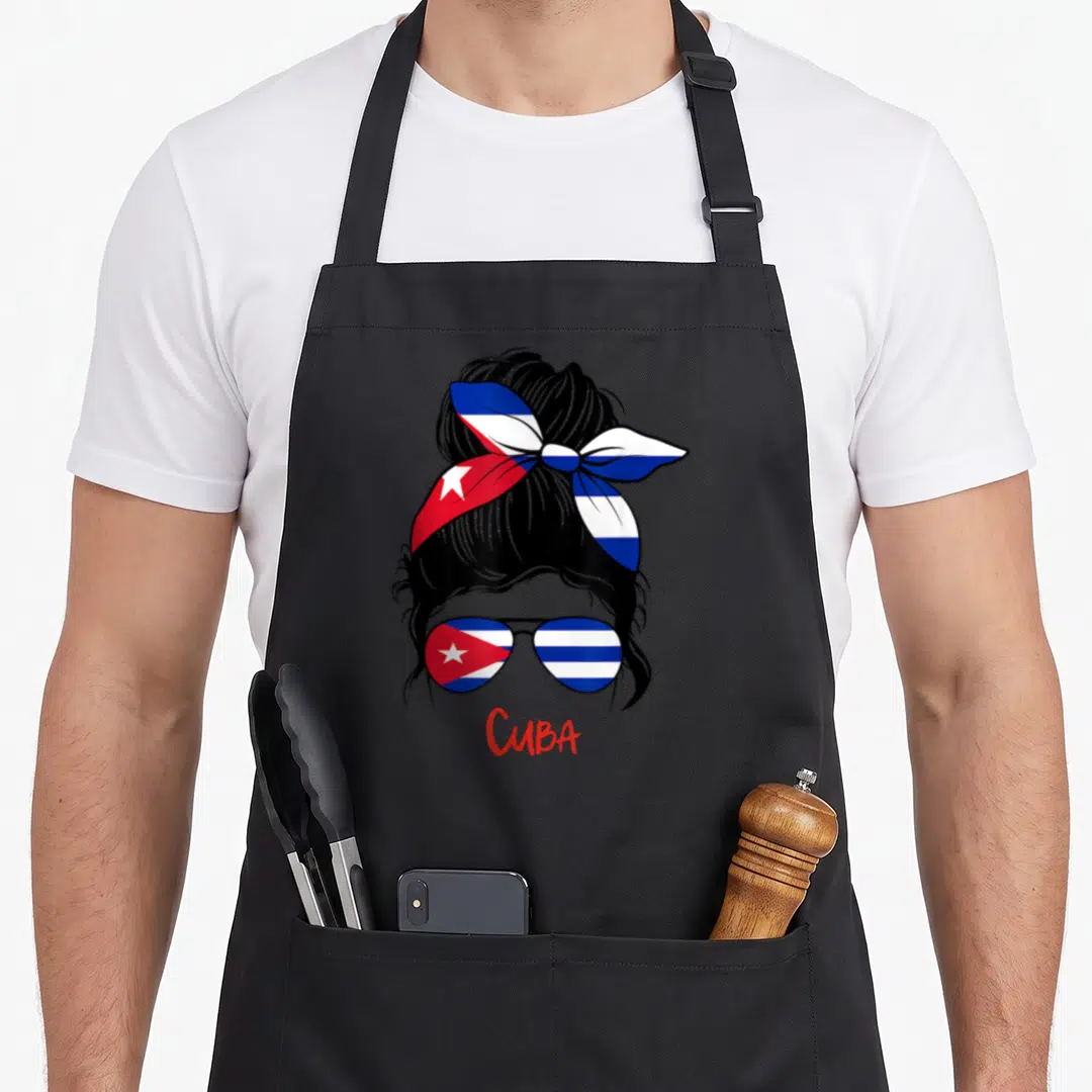 Cuba cuban girl apron - Black silhouette woman with flag headband and sunglasses above red CUBA text — shown on a black cotton canvas apron against a white background