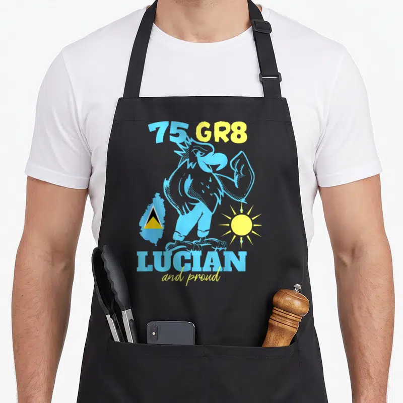 75gr8 pride apron - Muscular bird mascot with St Lucia map flag and 75 GR8 text in blue and yellow — shown on a black cotton canvas apron against a white background