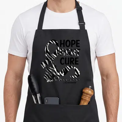Hope zebra apron - Zebra print awareness ribbon with boxing gloves and stacked Hope Fight Cure text — shown on a black cotton canvas apron against a white background
