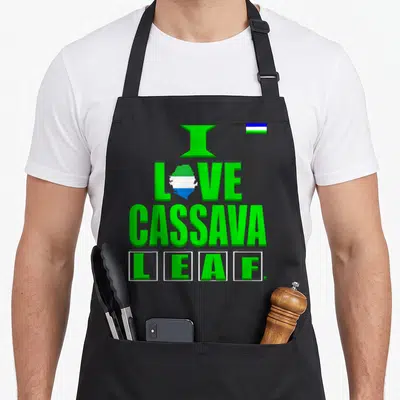 Cassava food aprons - Green I Love Cassava Leaf text with Sierra Leone map and small flag icon — shown on a black cotton canvas apron against a white background