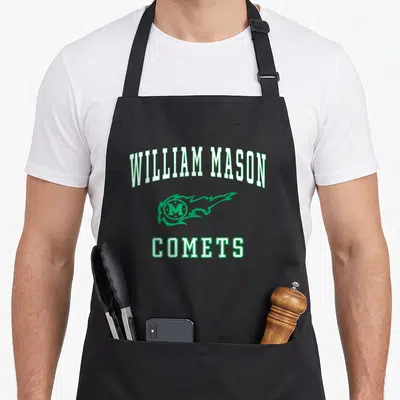 William mason apron - Green and white WILLIAM MASON COMETS text and comet logo on black apron — shown on a black cotton canvas apron against a white background