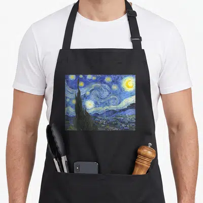 Night vincent van gogh apron - Starry night landscape with dark cypress tree, swirling blue sky, yellow moon — shown on a black cotton canvas apron against a white background