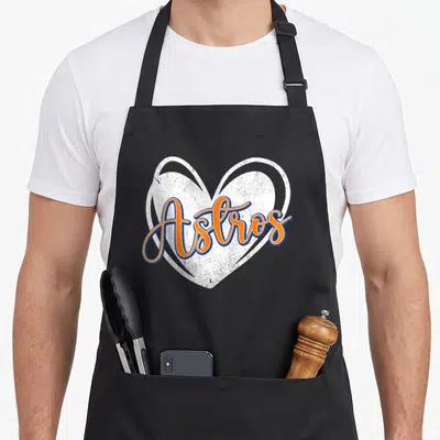 Astro 70s apron - Orange Astros script over distressed white heart with blue outline — shown on a black cotton canvas apron against a white background
