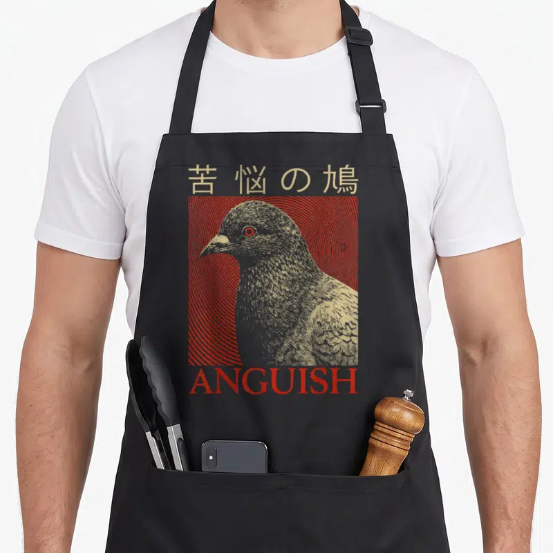 Anguish pigeon lover apron - Grey pigeon in line art facing left over red concentric circles with Japanese and English — shown on a black cotton canvas apron against a white background
