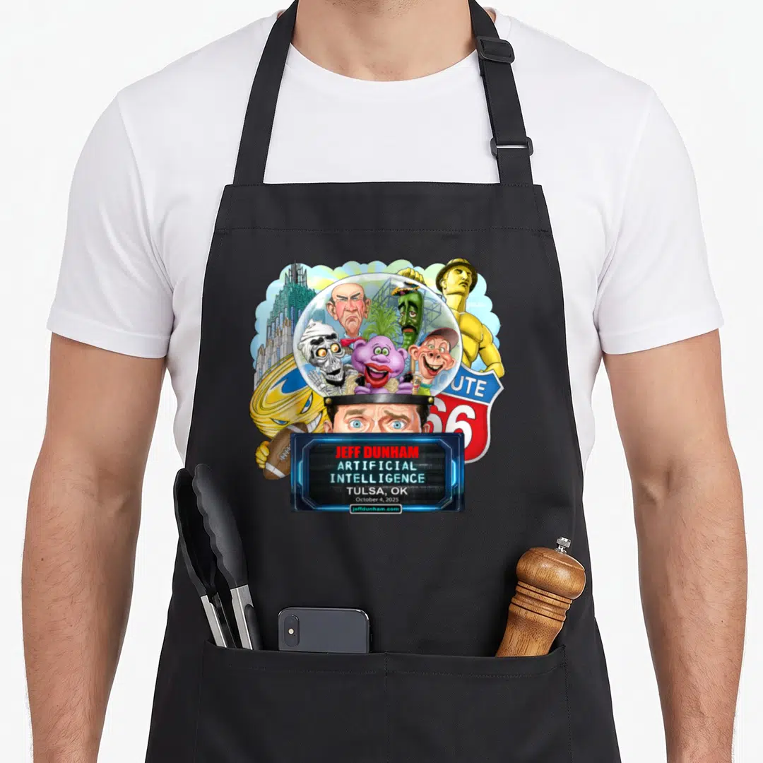 Funny jeff tulsa apron - Jeff Dunham Artificial Intelligence Tulsa 2025 print with five puppets under glass dome — shown on a black cotton canvas apron against a white background