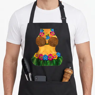 Hula body apron - Cartoon woman torso with coconut bra, grass skirt, and pink blue yellow tropical flowers — shown on a black cotton canvas apron against a white background