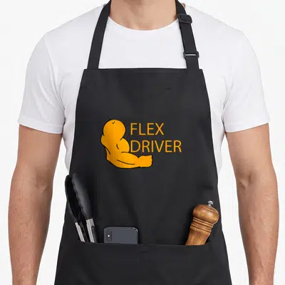 Flex delivery driver apron - Cartoon orange flexed bicep next to stacked FLEX DRIVER text — shown on a black cotton canvas apron against a white background
