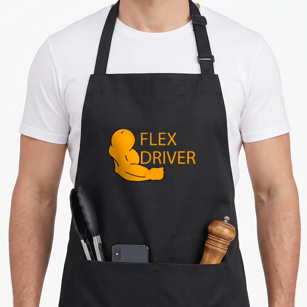 Flex delivery driver apron - Cartoon orange flexed bicep next to stacked FLEX DRIVER text — shown on a black cotton canvas apron against a white background