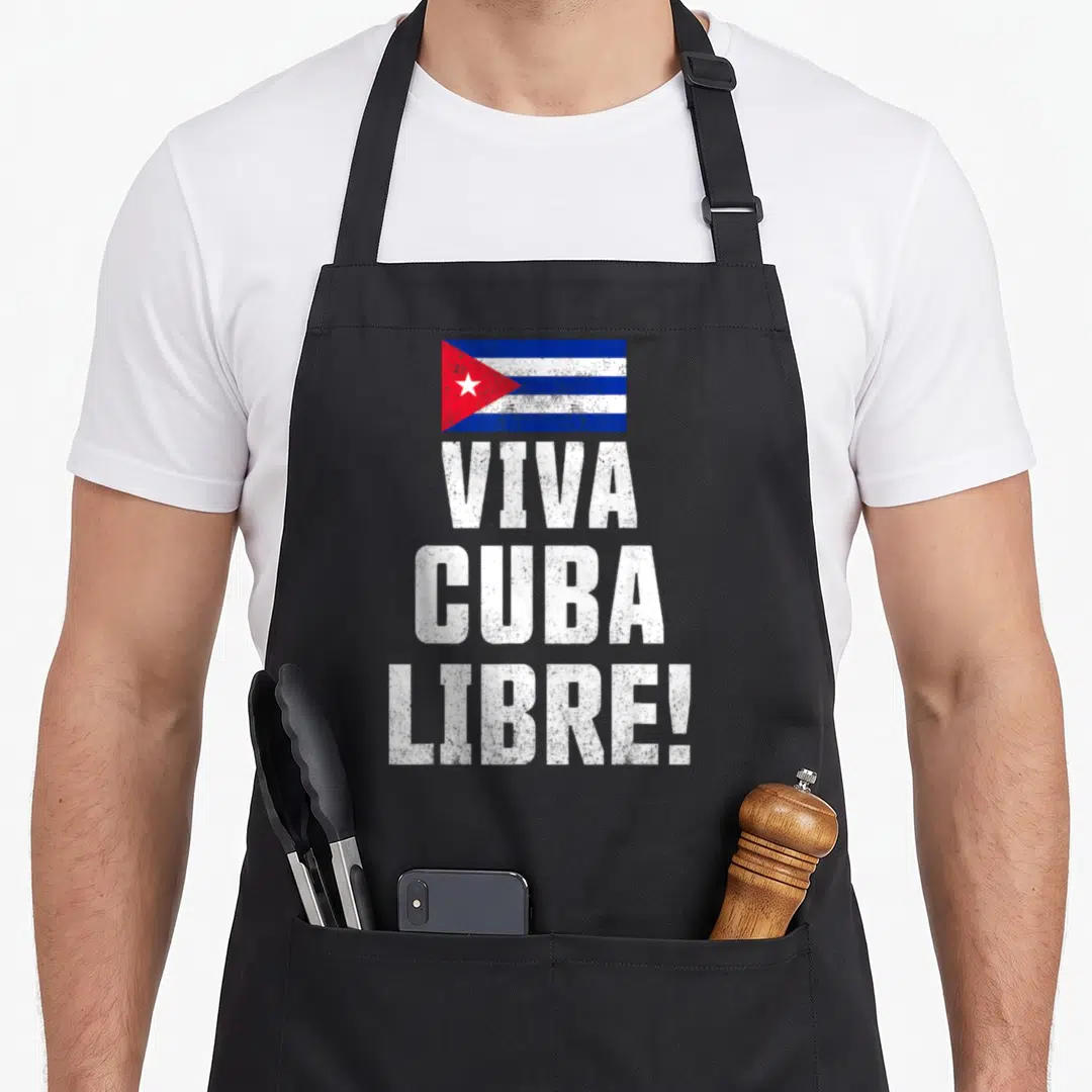 Viva cuba apron - Cuban flag above distressed white text reading VIVA CUBA LIBRE! — shown on a black cotton canvas apron against a white background
