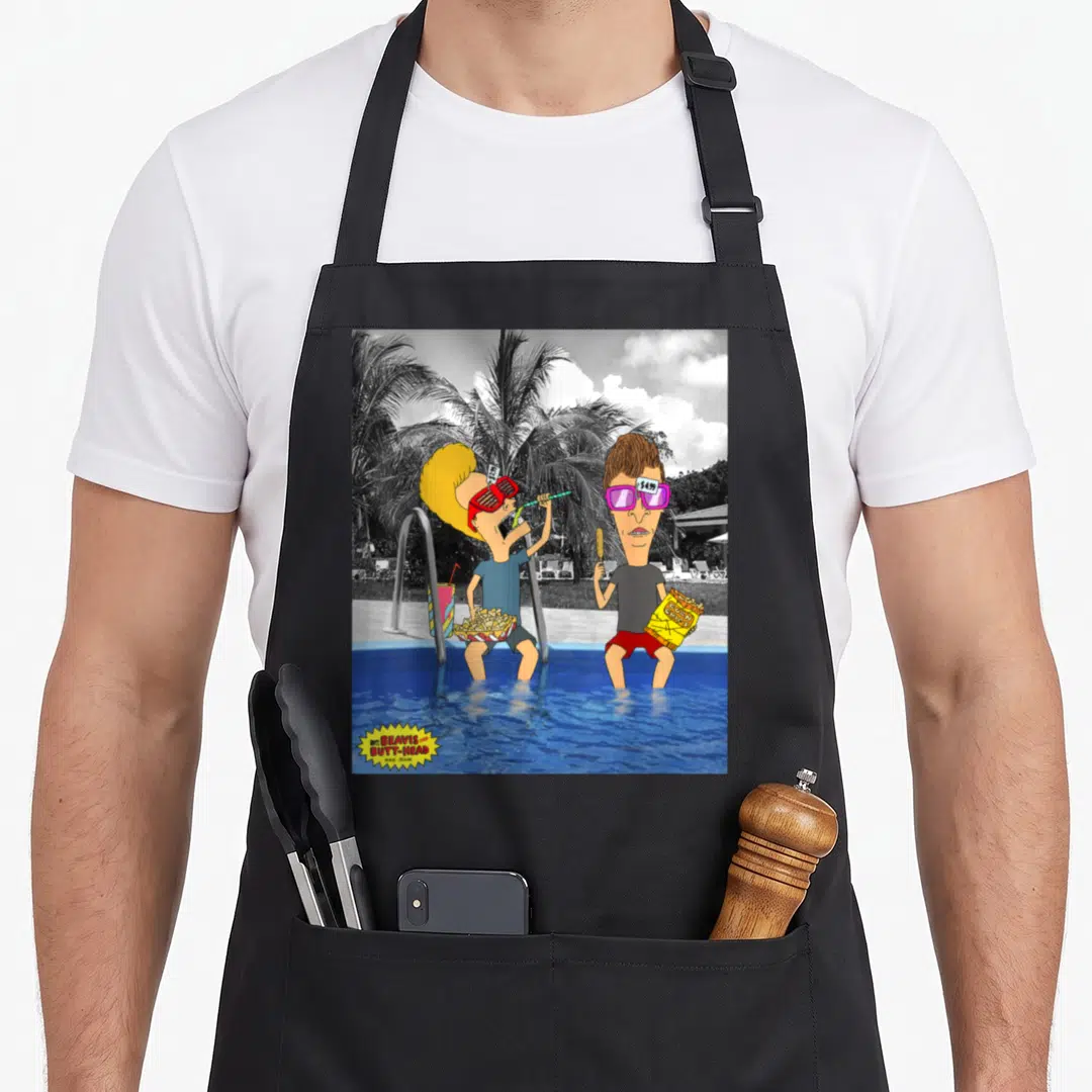 Lounging judge apron - Beavis and Butt-Head at pool with price tags on red and purple sunglasses — shown on a black cotton canvas apron against a white background