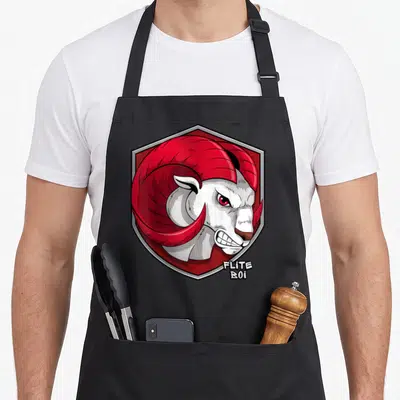 Flite ram apron - Cartoon ram head in red and white hexagon with FLITE BOi text — shown on a black cotton canvas apron against a white background