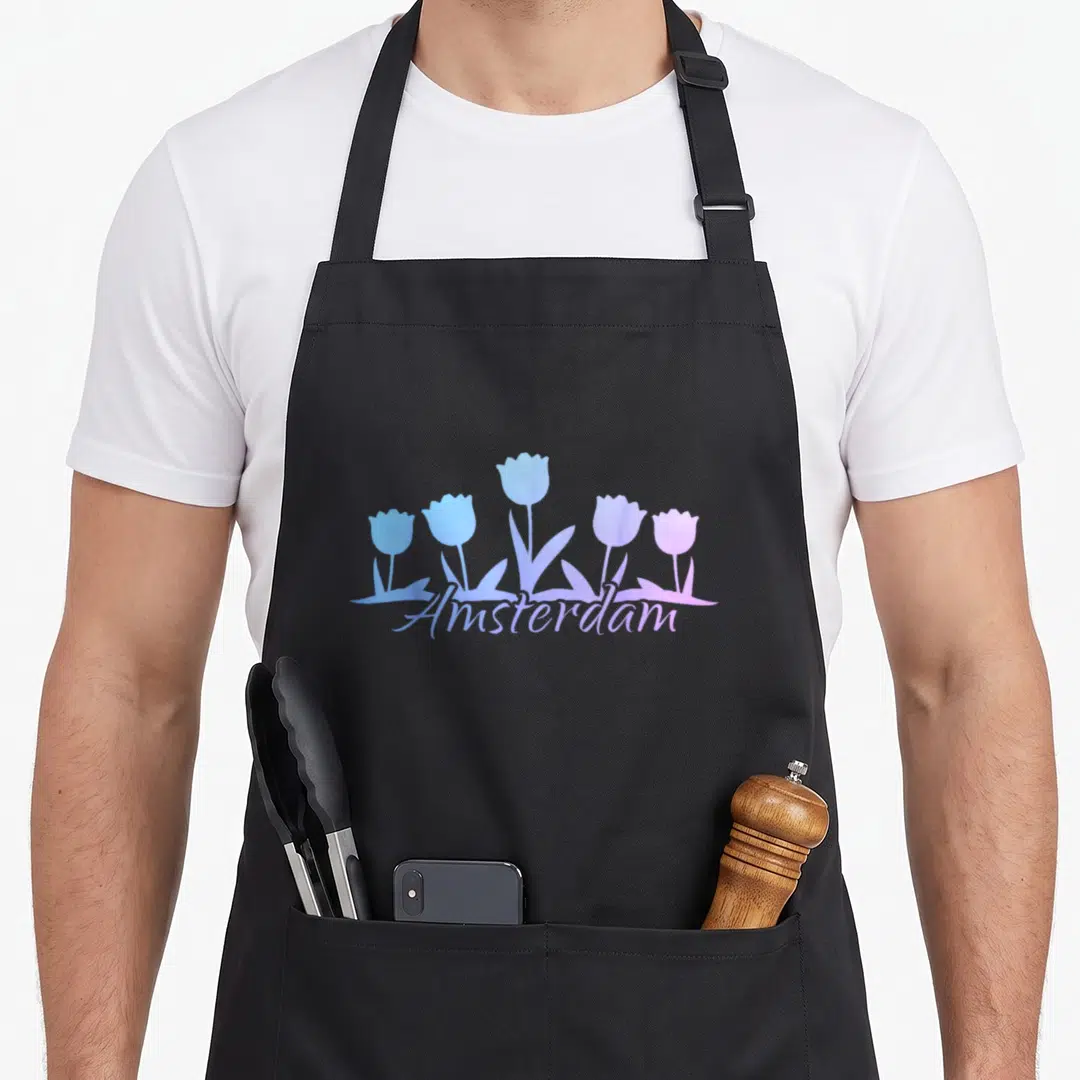 Amsterdam netherland tulip apron - Five blue and purple tulip silhouettes with Amsterdam script text — shown on a black cotton canvas apron against a white background