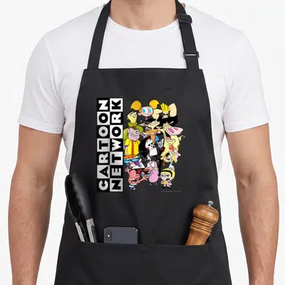 Character cartoon apron - Vertical Cartoon Network logo next to a cluster of animated characters in black white yellow — shown on a black cotton canvas apron against a white background