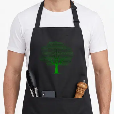 Coding science apron - Green tree silhouette formed by lines of binary code digits — shown on a black cotton canvas apron against a white background