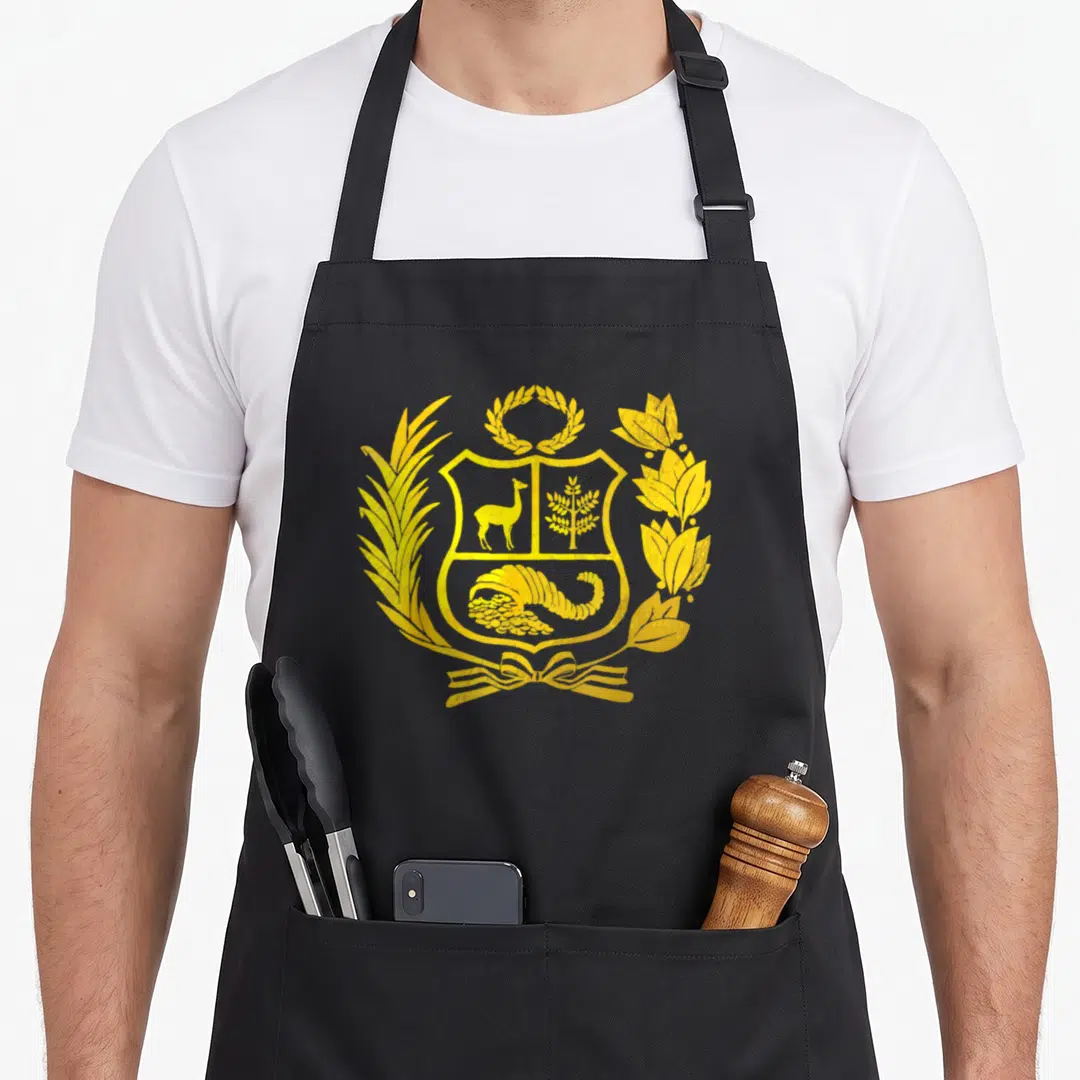 Polo pride apron - Yellow distressed coat of arms with vicuna, tree, cornucopia, and laurel wreath on grey background — shown on a black cotton canvas apron against a white background