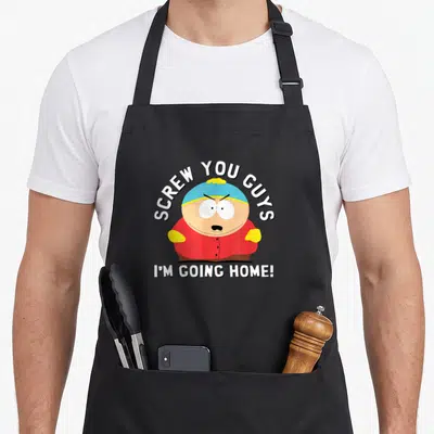 Screw park apron - Cartoon character in red coat and blue hat with arched white text SCREW YOU GUYS above and I'M GOING — shown on a black cotton canvas apron against a white background