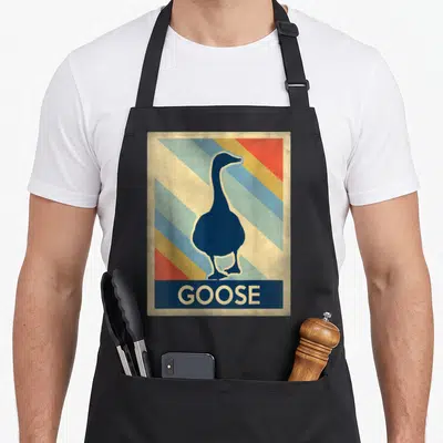 Vintage goose apron - Retro blue goose silhouette over red yellow and blue stripes with beige text GOOSE on bottom bar — shown on a black cotton canvas apron against a white background