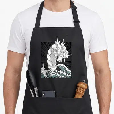 Gyarado anime apron - Dragon emerging from light blue waves in white and black line art with sunburst background — shown on a black cotton canvas apron against a white background