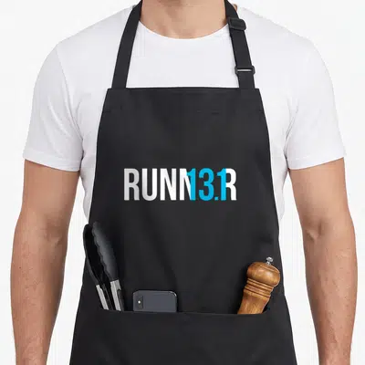 Runner marathoner marathon apron - White and blue RUNN13.1R text design on grey background — shown on a black cotton canvas apron against a white background