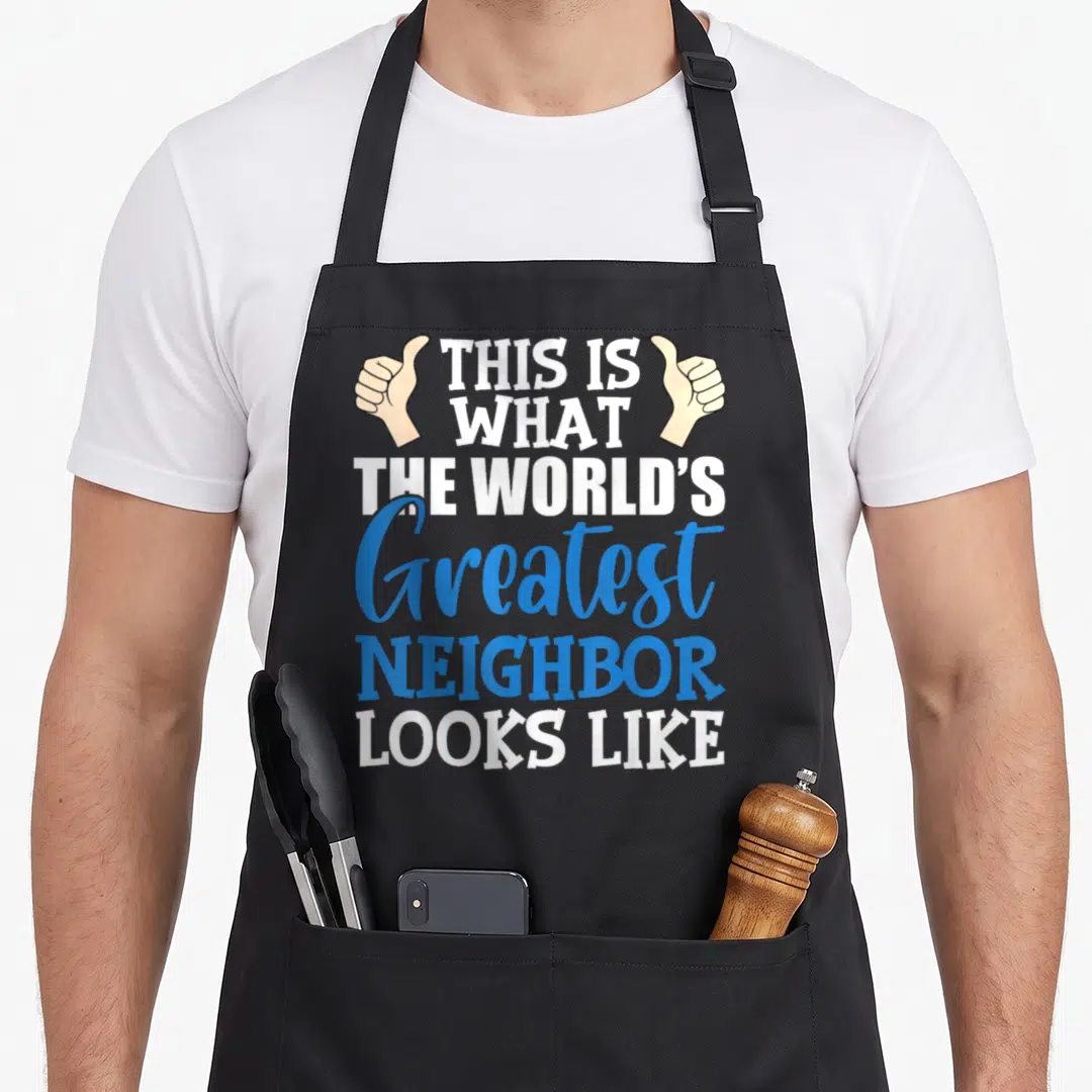 Neighbor worlds greatest apron - Stacked text reading This Is What The Worlds Greatest Neighbor Looks Like flanked — shown on a black cotton canvas apron against a white background