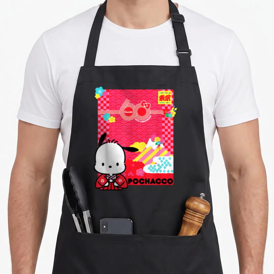 Pochacco general apron - Pochacco character in red kimono with From Tokyo text and 60th anniversary logo on red — shown on a black cotton canvas apron against a white background